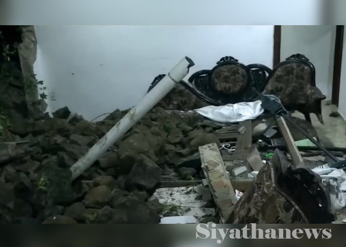 ලබුදූවේ නිවසක් මතට ගල් බැම්මක් කඩා වැටෙයි- කාන්තාවකට තුවාල(VIDEO)
