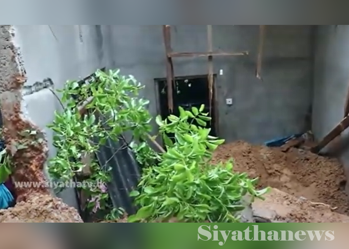 නිවසක් මතට පස් කන්දක් කඩා වැටී අවුරුදු 17ක දරුවෙක් මරුට(VIDEO)