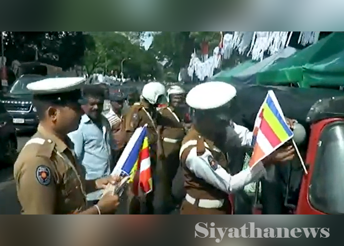වෙසක් මංගල්‍යය වෙනුවෙන් රට පුරා වැඩසටහන් – ත්‍රීරෝද රථවලට බෞද්ධ කොඩි දස දහසක් (VIDEO)